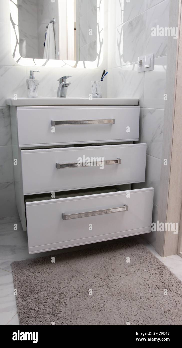 Modern bathroom vanity with pullout drawers and moisture protection