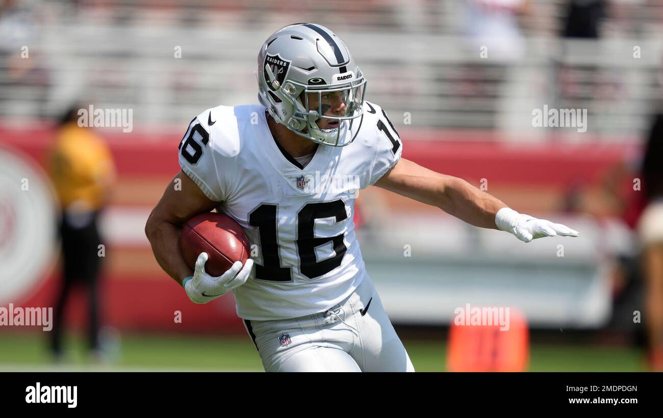 Santa Clara, United States. 29th Aug, 2021. Las Vegas Raiders Dillon Stoner  (16) tries tto hold off San Francisco 49ers Eli Mitchell (49) on the  opening kickoff at Levi's Stadium in Santa