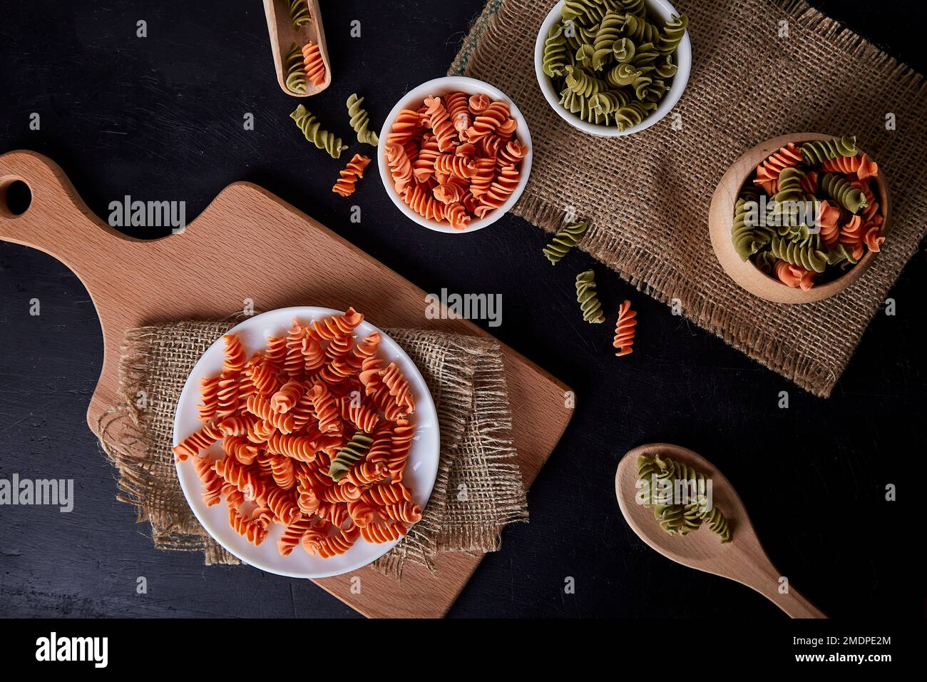 Gluten free fusilli pasta of green pea and carrot flat lay. Organic