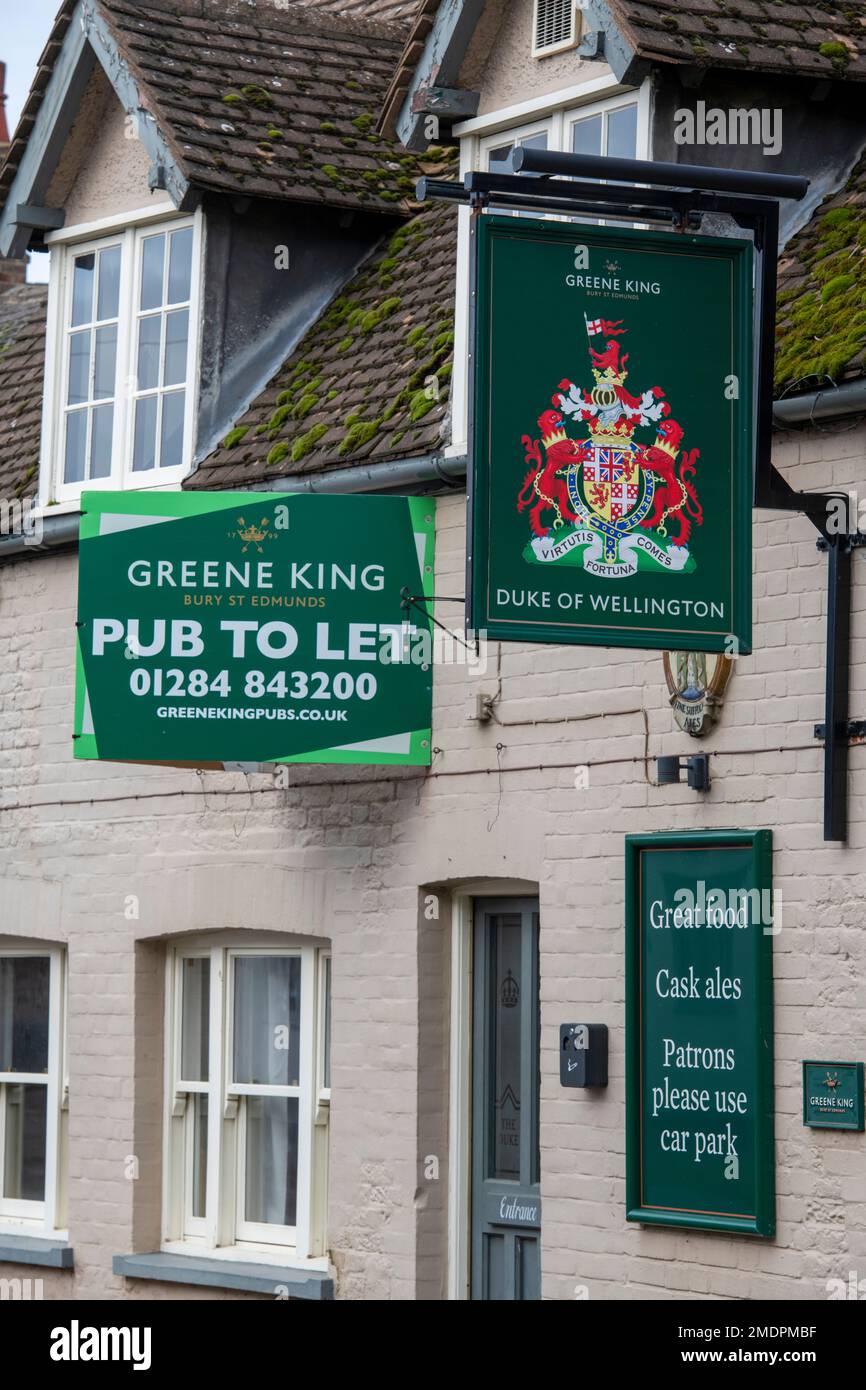 Signs on a pub to let. The Duke of Wellington pub is for rent at a time when the hospitality industry is struggling with the economy. Stock Photo