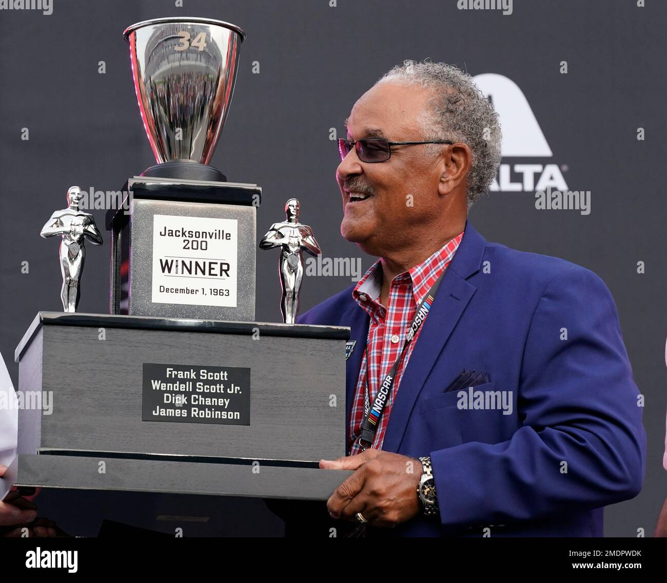 Wendell Scott s Son Frank Scott Admires The Trophy Presented To Him And wendell-scott-s-son-frank-scott-admires-the-trophy-presented-to-him-and