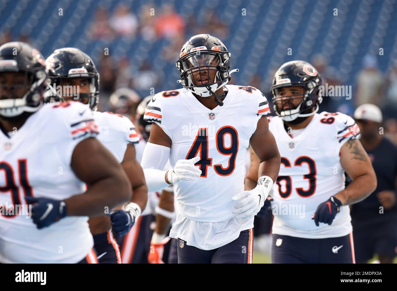 Chicago Bears linebacker Charles Snowden (49) warms up before a