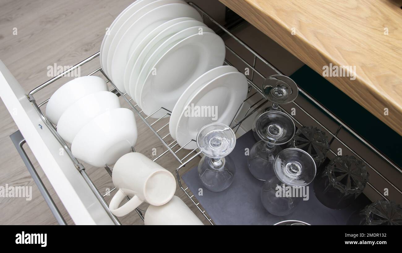 Modern custom kitchen with drawers for utensils. Accessories in the