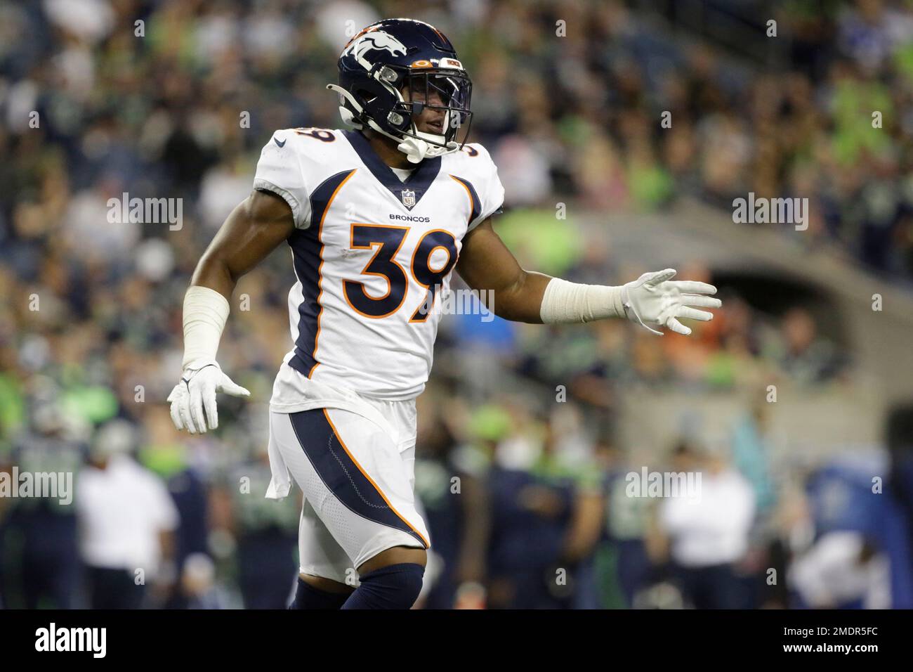 Denver Broncos running back Damarea Crockett (39) is tackled against the  Los Angeles Rams during the