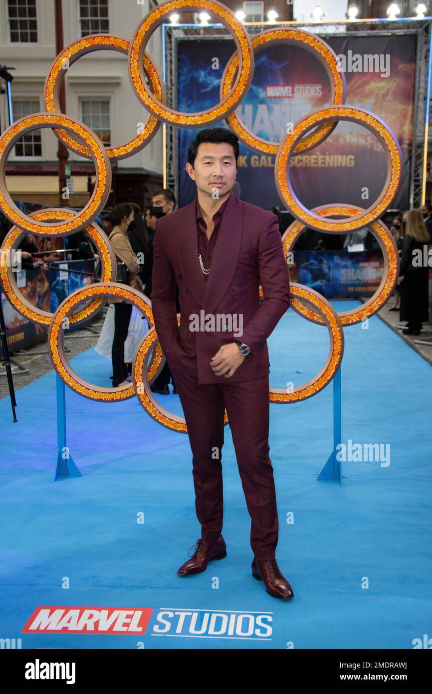 Actor Simu Liu poses for photographs on the red carpet for the premiere ...