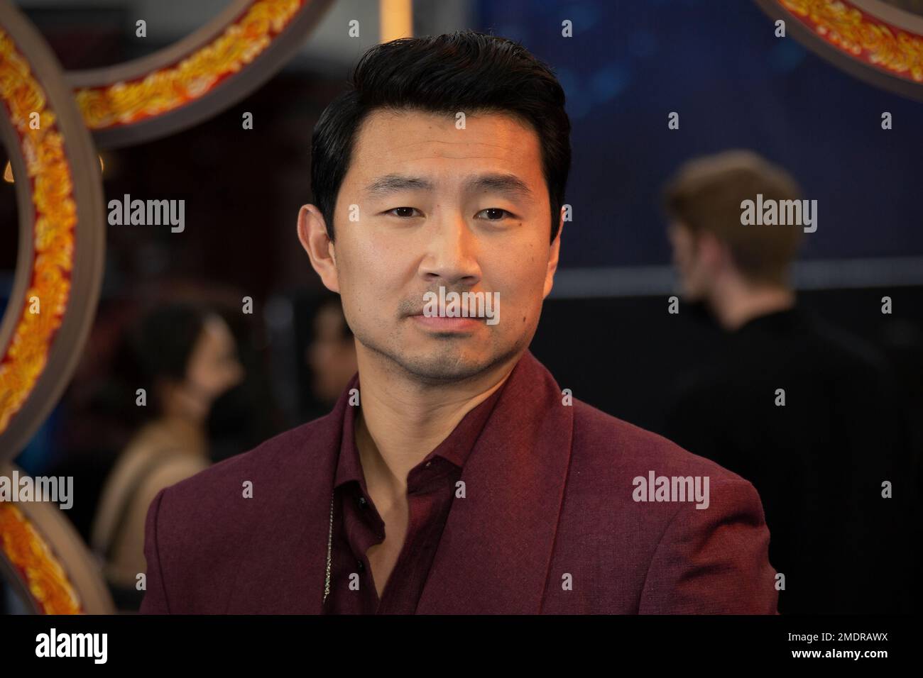 Actor Simu Liu poses for photographs on the red carpet for the premiere ...
