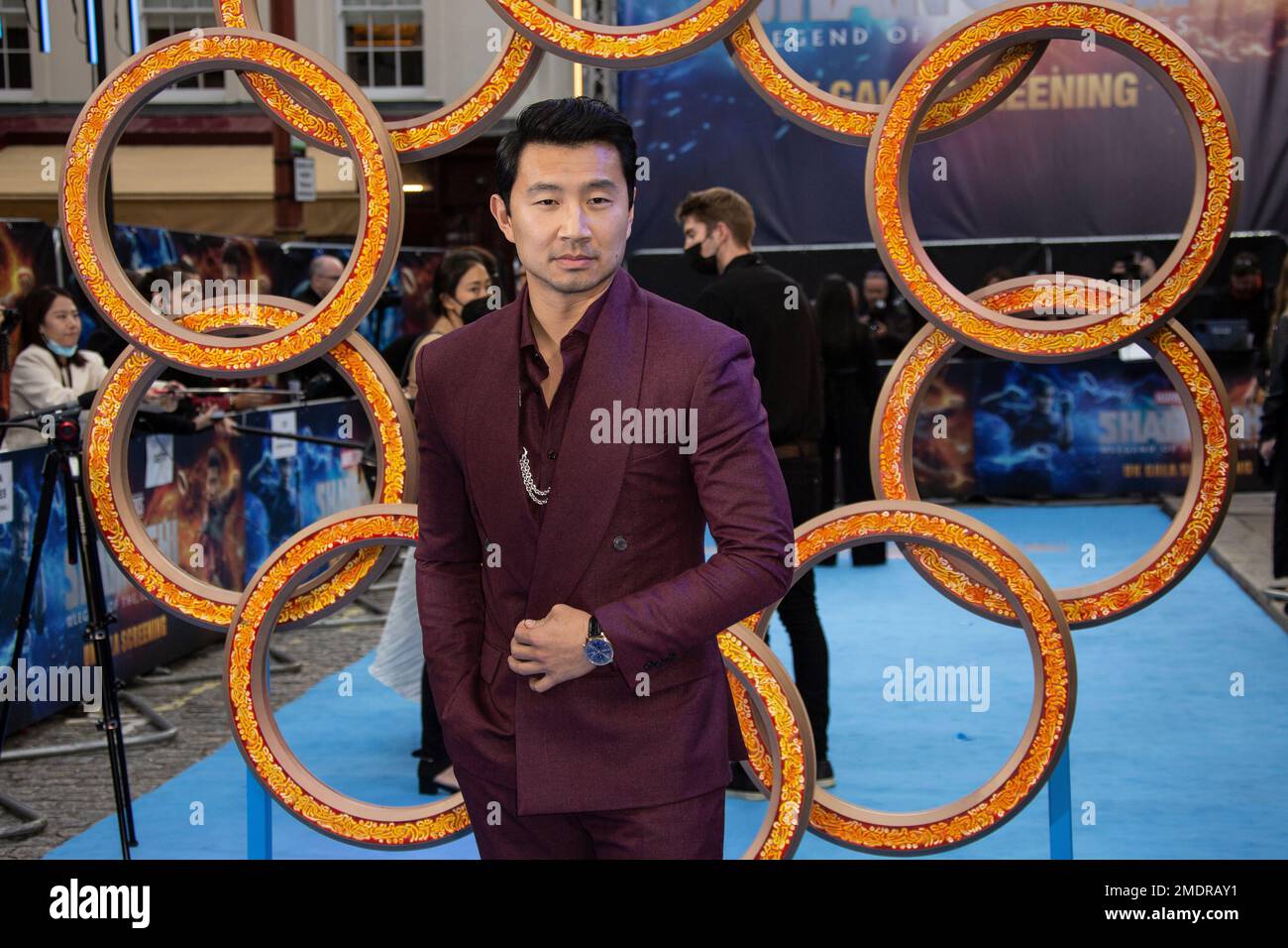 Actor Simu Liu poses for photographs on the red carpet for the premiere ...