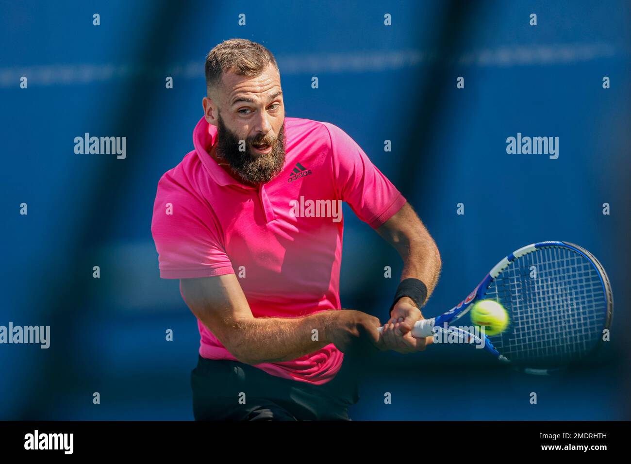 Benoit Paire, of France, hits a return to Emil Ruusuvuori in the Round of 16 at the Winston-Salem Open tennis tournament in Winston-Salem, N.C., Wednesday, Aug