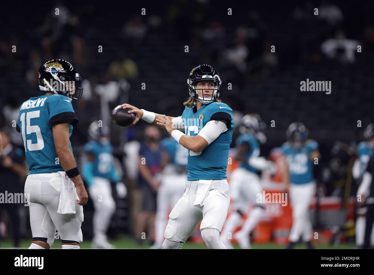 Jacksonville Jaguars quarterback Trevor Lawrence (16) and quarterback