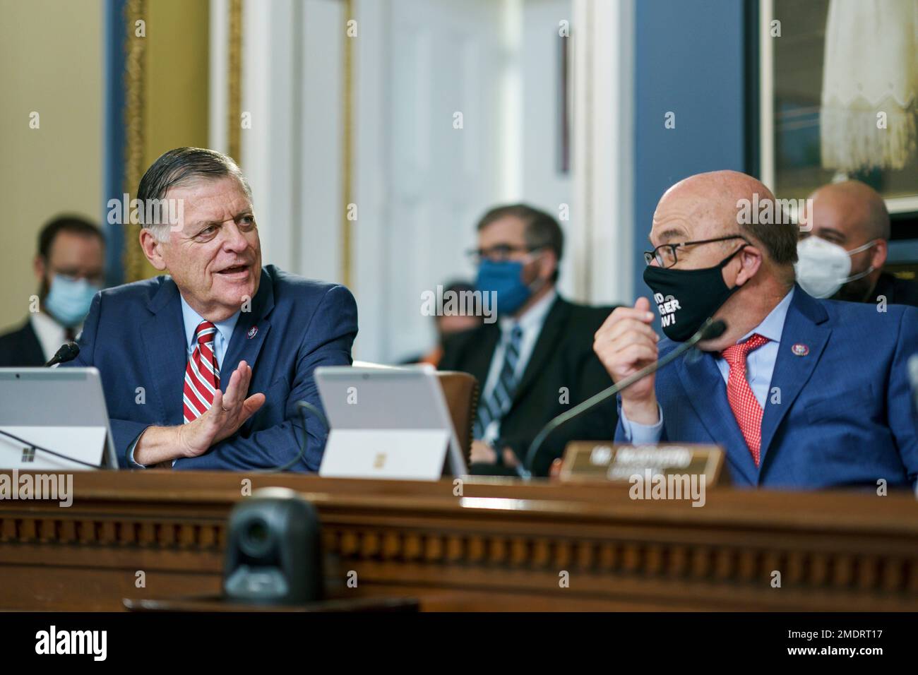 Rep. Tom Cole, ROkla., the ranking Republican, left, confers with