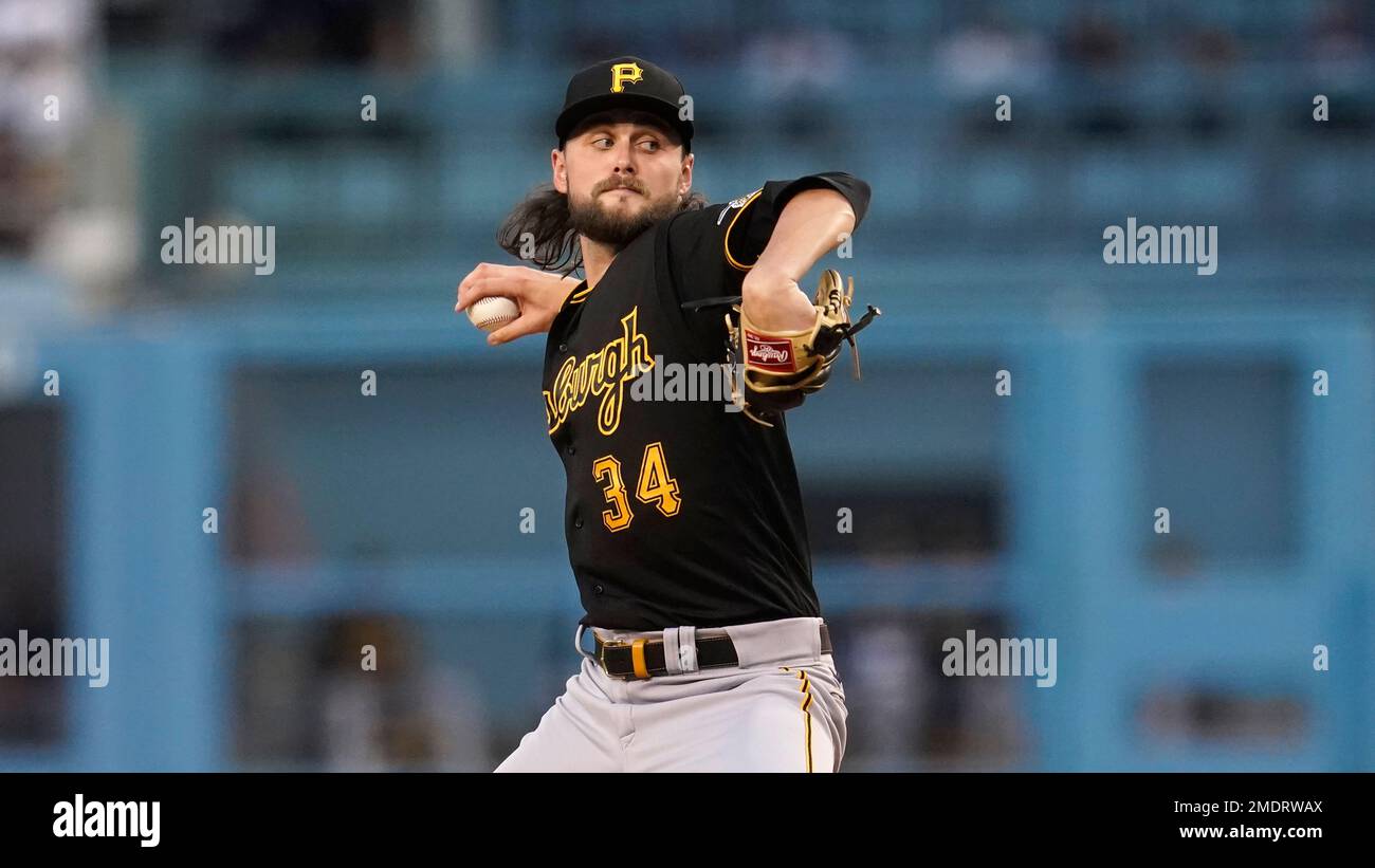 Pittsburgh Pirates starting pitcher JT Brubaker throws to the Los ...