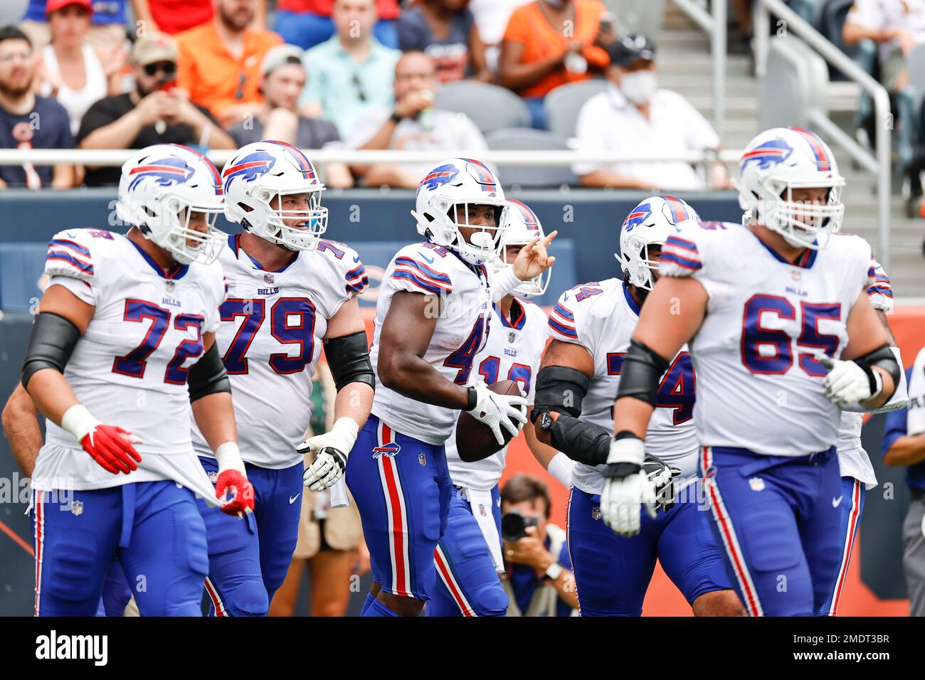 Buffalo Bills fullback Reggie Gilliam (41) celebrates with teammates after  scoring a touchdown against the Chicago Bears during the first half of a  preseason NFL football game, Saturday, Aug. 21, 2021, in