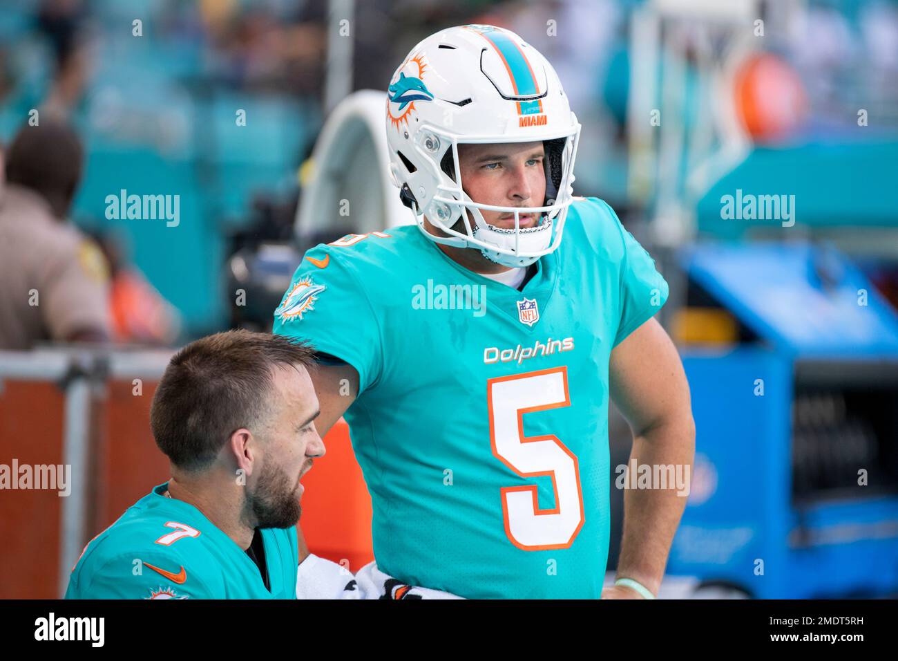 Miami Dolphins punter Michael Palardy (5) and Miami Dolphins kicker Jason  Sanders (7) talk on the sideline before the start of a preseason NFL  football game between the Atlanta Falcons and the