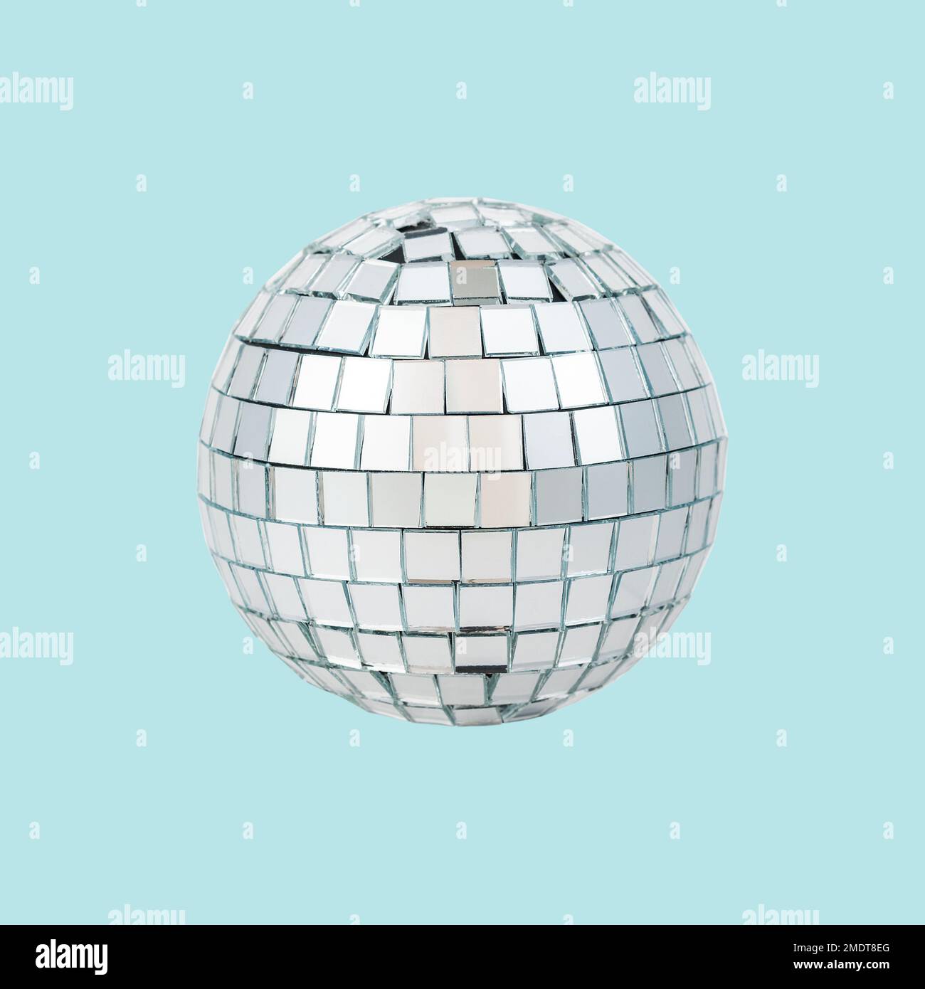 Party Disco Ball isolated on blue background. Stock Photo