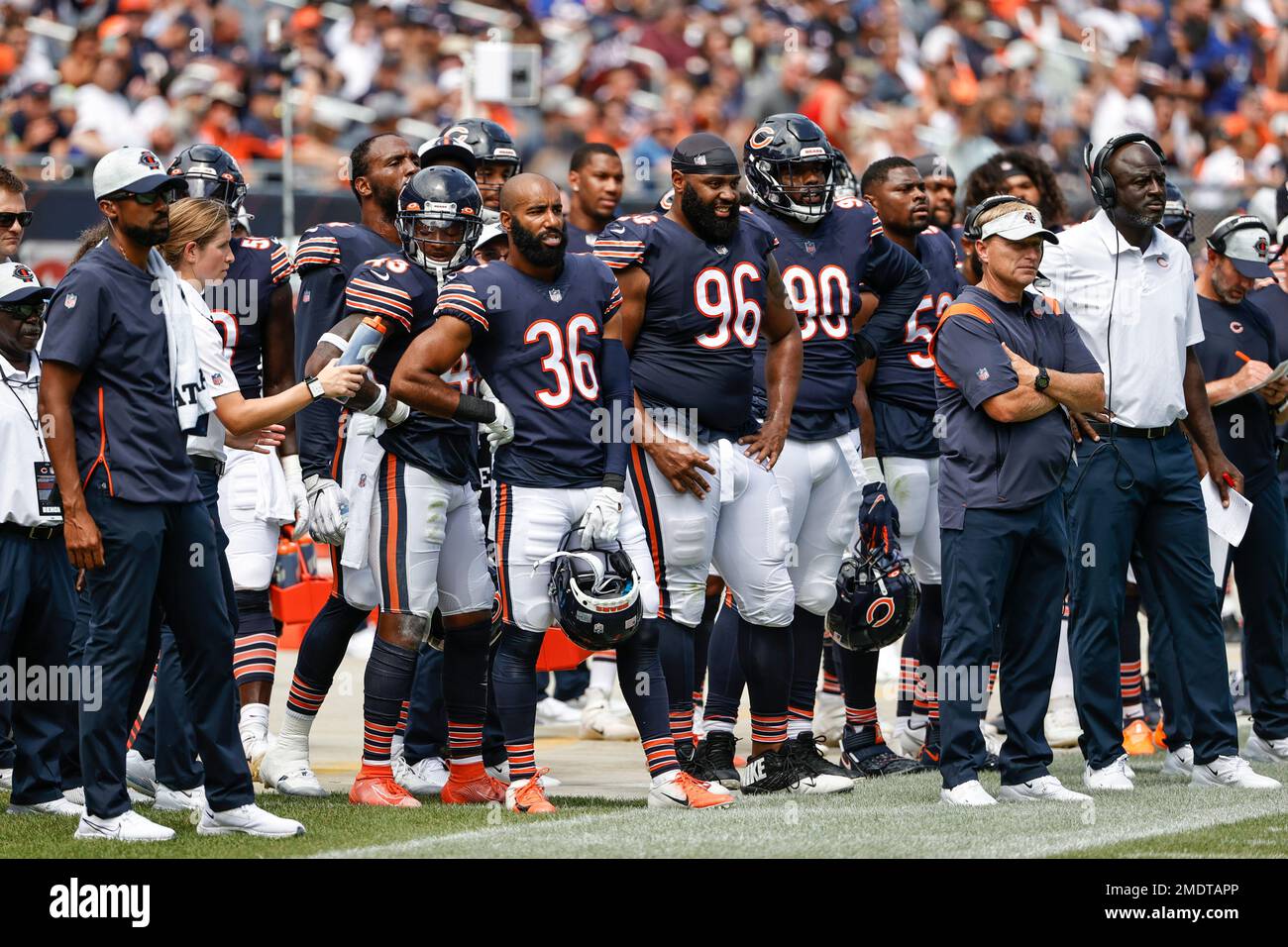 Chicago Bears defensive back DeAndre Houston-Carson (36), defensive end  Akiem Hicks (96) and defensive end Angelo Blackson (90) look on from the  sidelines during the first half of a preseason NFL football