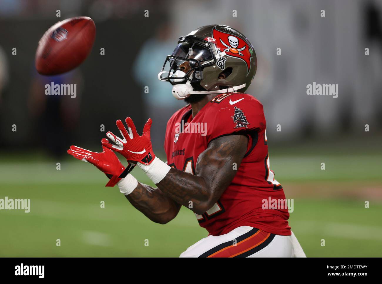 Tampa Bay Buccaneers running back Ke'Shawn Vaughn (21) catches the football  against the Tennessee Titans during the second half of an NFL preseason  football game Saturday, Aug. 21, 2021, in Tampa, Fla. (