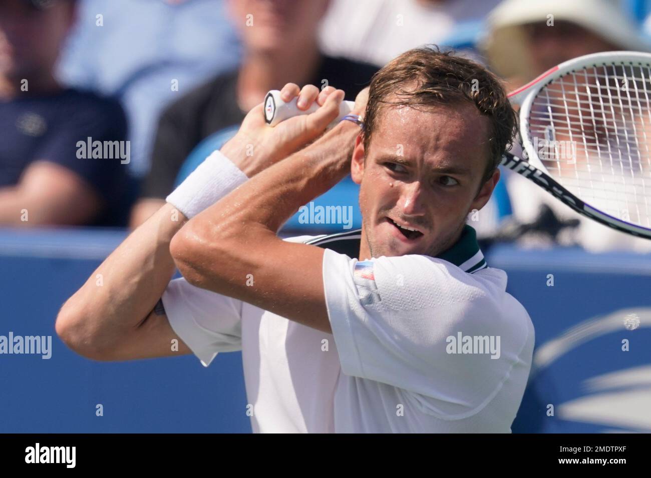 Daniil Medvedev, of Russia, returns a shot to Pablo Carreno Busta, of Spain, during the Western and Southern Open tennis tournament, Friday, Aug