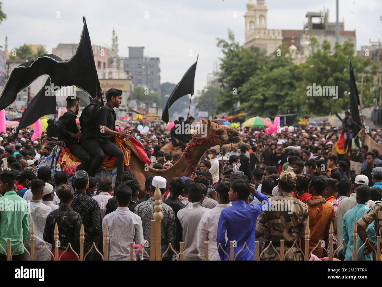 Shiite Muslims participate in a procession to mark Ashoura in Hyderabad ...