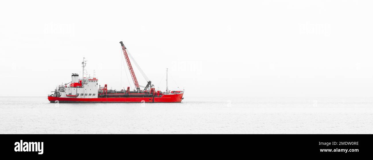 Crane vessel ship boat ship at sea offshore maritime industry wide for banner background Stock Photo
