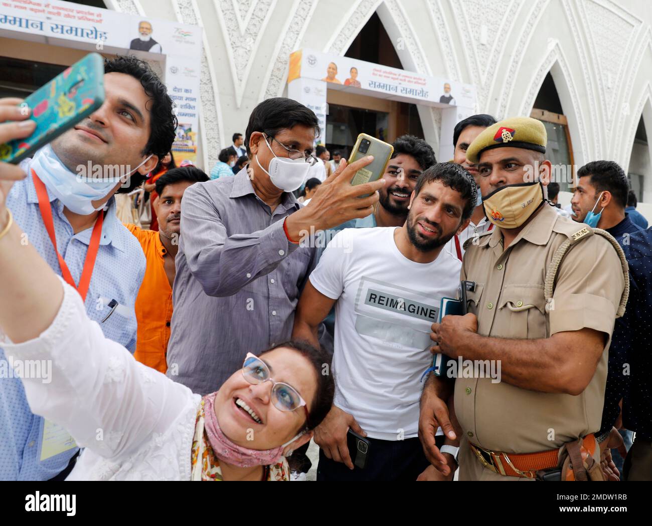 Olympics wrestling bronze medalist Bajrang Bajrang, wearing white