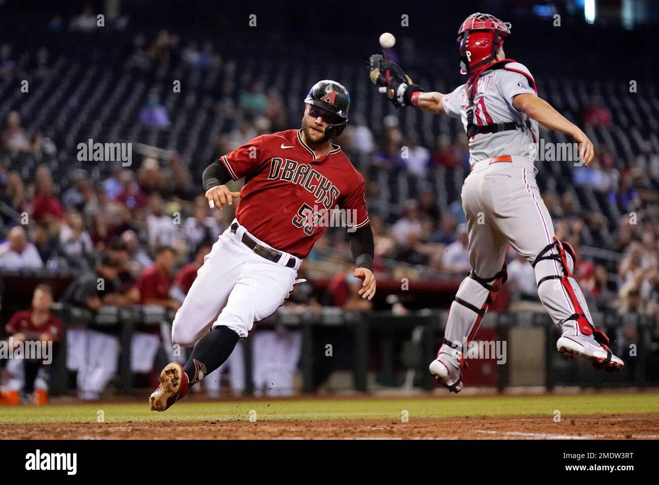 Arizona Diamondbacks' Christian Walker (53) scores a run as