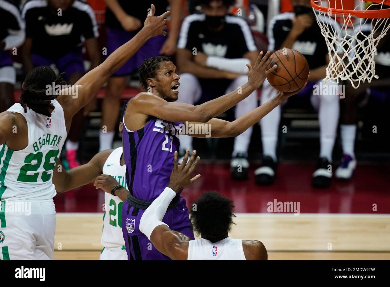 Sacramento Kings' Louis King shoots around Boston Celtics' Juhann