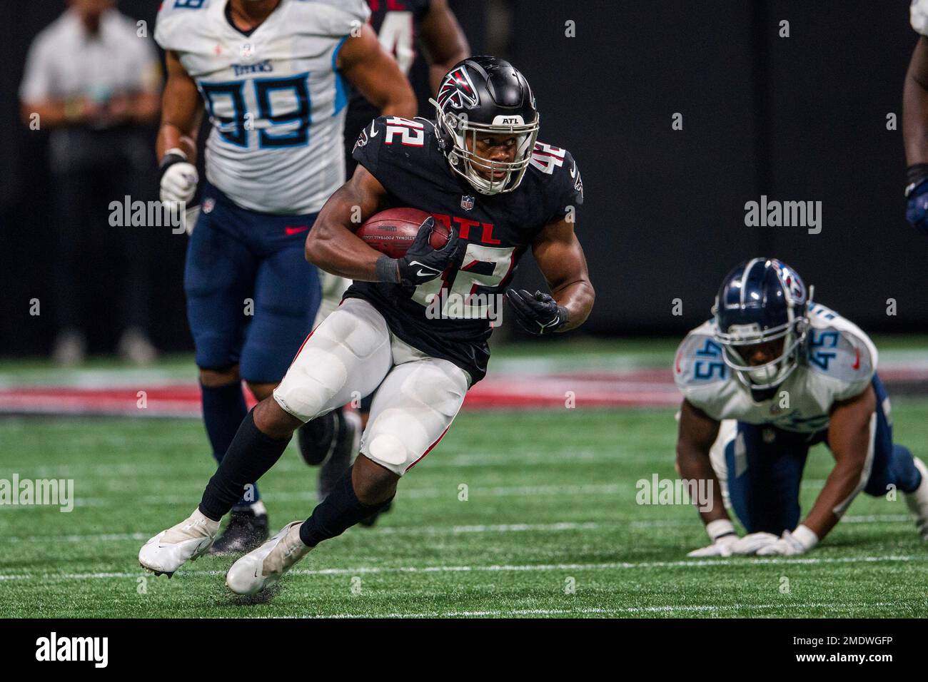 Atlanta Falcons running back Caleb Huntley (42) runs the ball during the  second half of a preseason NFL football game against the Tennessee Titans,  Friday, Aug. 13, 2021, in Atlanta. The Tennessee