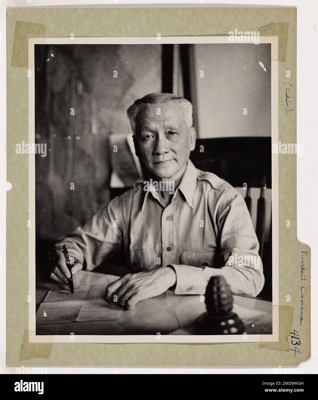 Philippine President Takes Over. With the liberation of the Philippines progressing swiftly, Sergio Osmena, President of the Philippine Commonwealth, has taken over civil administration in the freed areas of the archipelago. By special permission of the President, a Coast Guard combat photographer made this excellent study of Osmena at his desk in the temporary capitol building at Tacloban, Leyte Island, before the government was transferred to Manila. Stock Photo