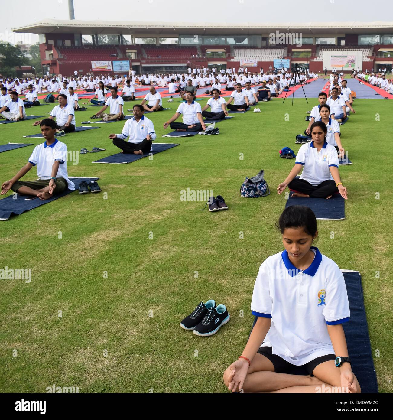 New Delhi, India, June 21 2022 Group Yoga exercise session for people
