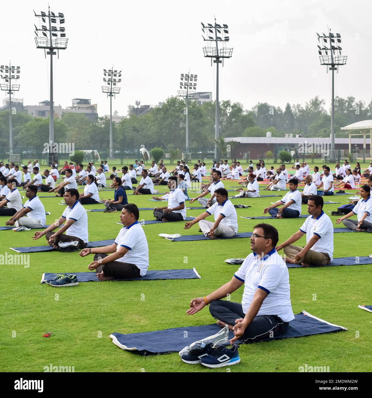 New Delhi, India, June 21 2022 Group Yoga exercise session for people