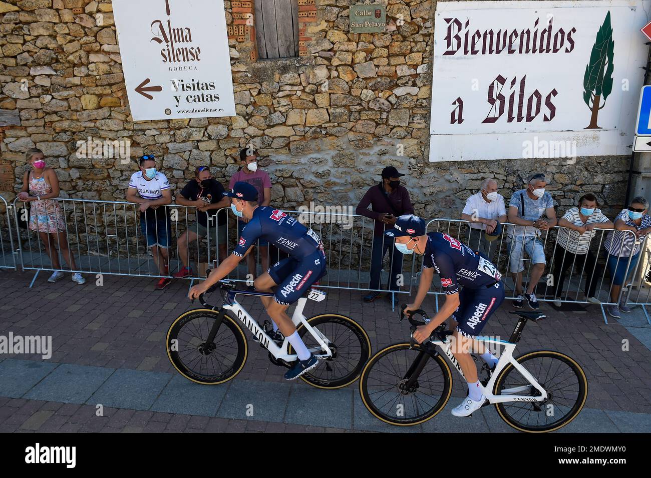 Alpecin-Fenix's Floris de Tier and Tobias Bayer, left, before the start of  the third stage between Santo Domingo de Silos-Alto Picon, 202,8 kilometers  of La Vuelta cycling race, northern Spain, Monday, Aug.