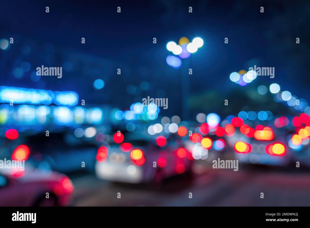 Blurred car traffic lights at night city. Traffic jam in evening rush ...