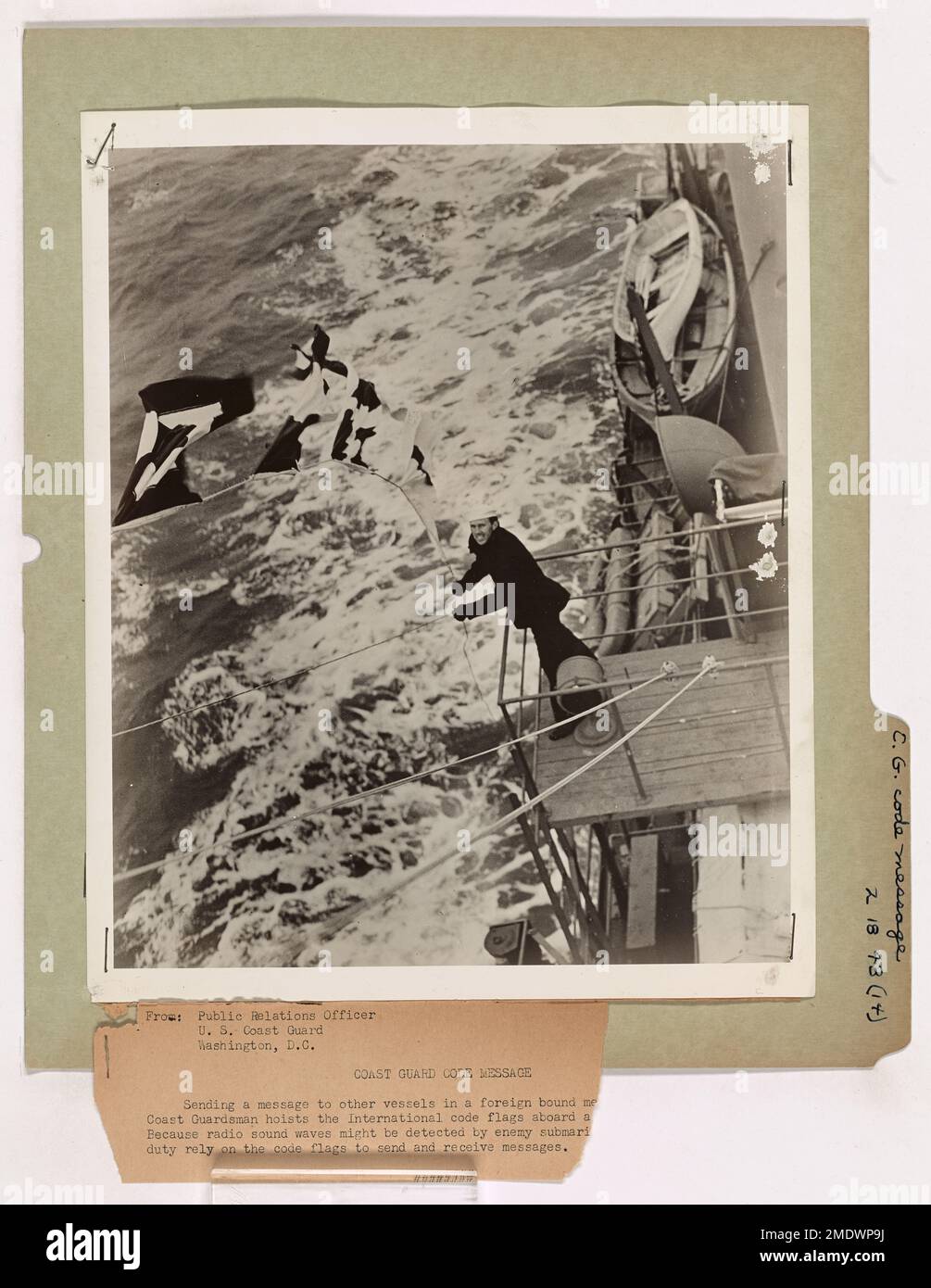 Coast Guard Code Message. This image depicts a Coast Guardsman hoisting