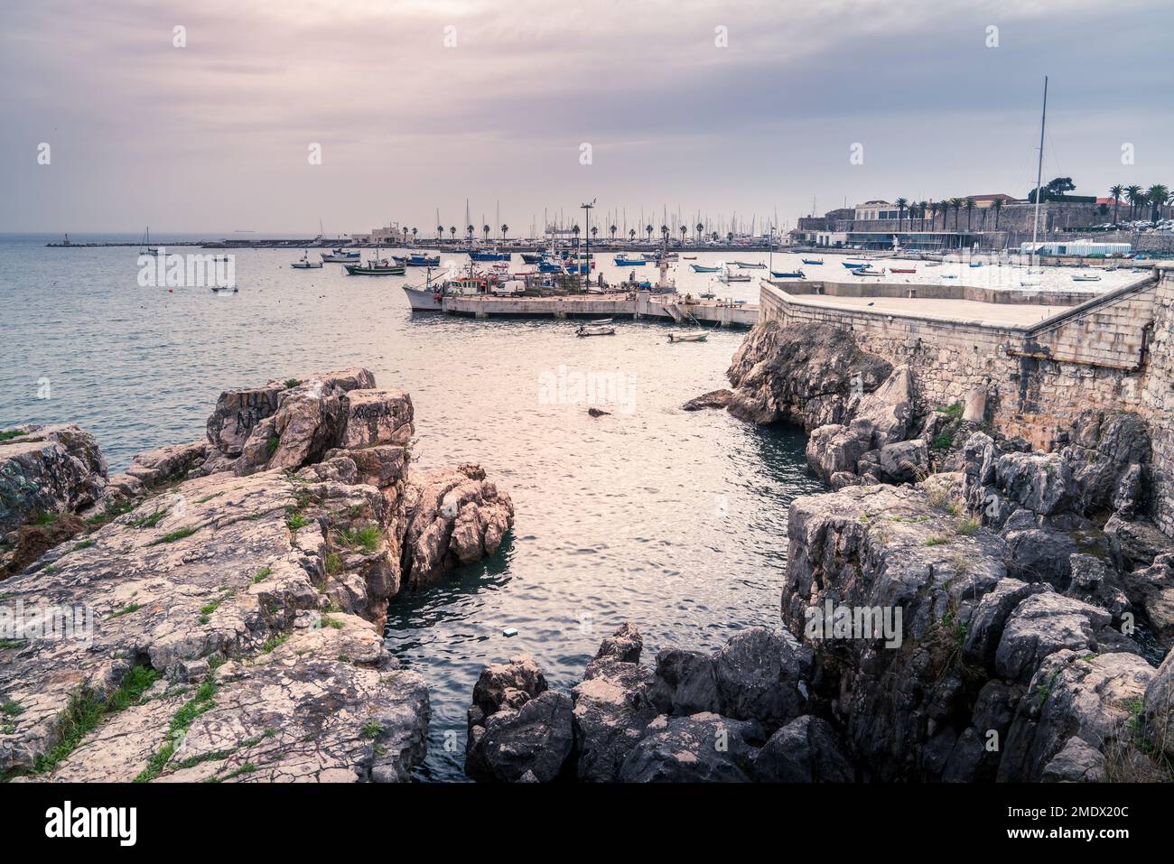 View of Atlantic coast in Cascais, Portugal with Naval Club and Citadel of Cascais Stock Photo