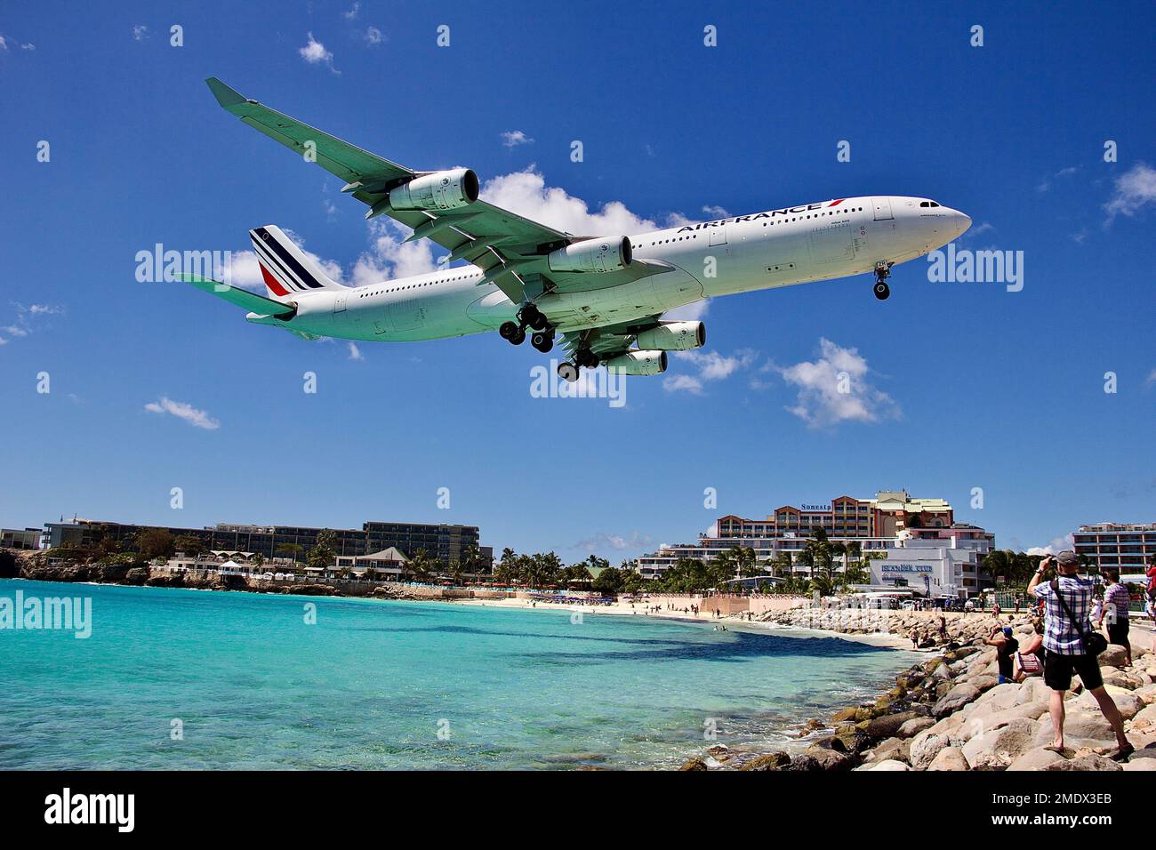 Airliners landing St. Maarten airport. Stock Photo