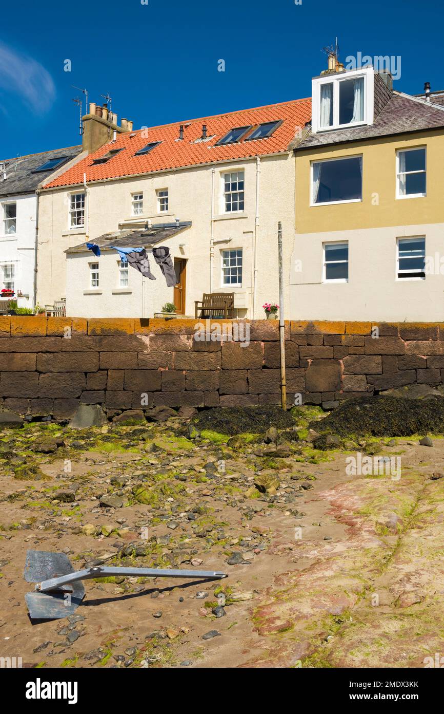 Traditional seaside cottages overlooking West Bay beach, in the coastal