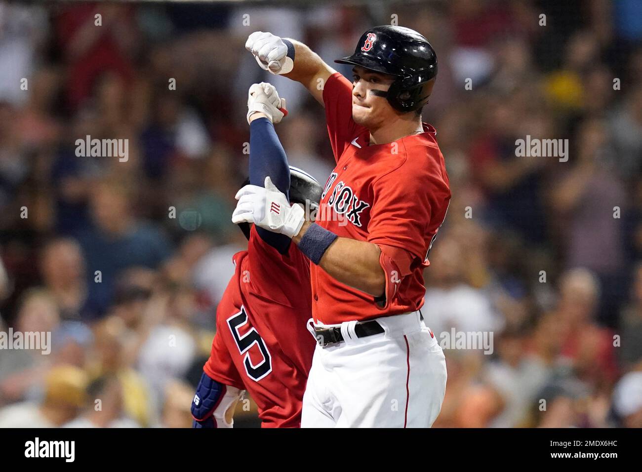 Boston Red Sox's Bobby Dalbec celebrates with Enrique Hernandez