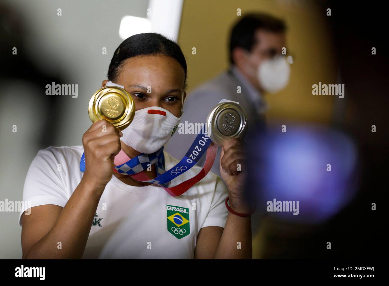 Brazilian gymnast, Rebeca Andrade, displays the gold and silver medals