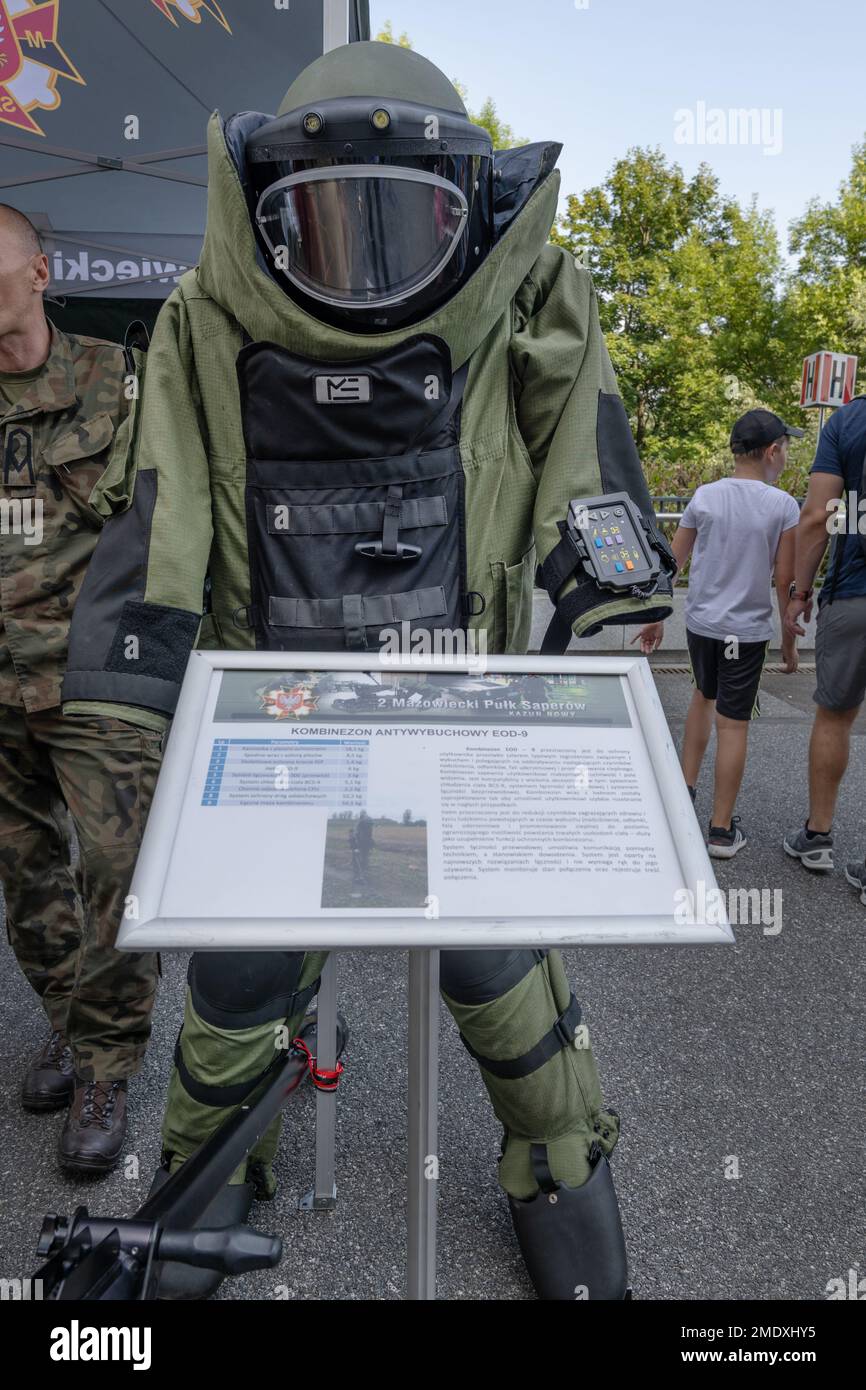 EOD 9 bomb suit and helmet ensemble for protection against explosive blast threats, overpressure, fragmentation, impact and heat or flame as exhibit o Stock Photo
