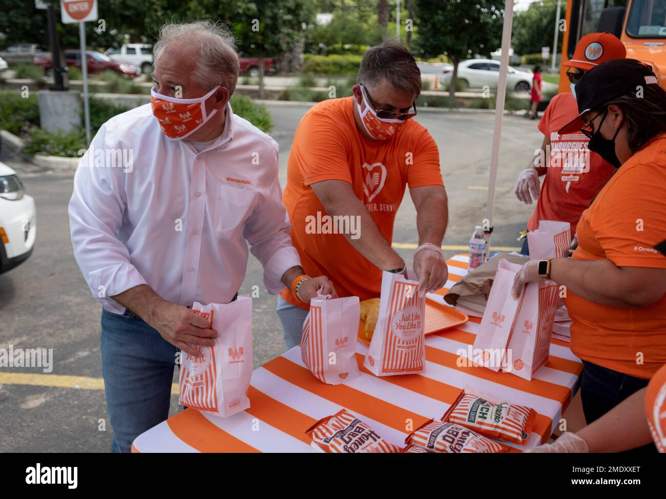IMAGE DISTRIBUTED FOR WHATABURGER Whataburger CEO Ed Nelson, left
