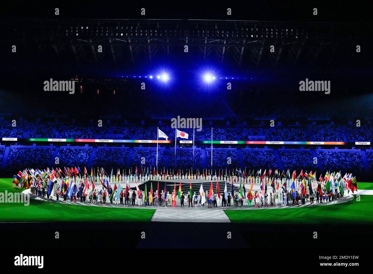 Flags bearers enter during the closing ceremony in the Olympic Stadium at the 2020 Summer