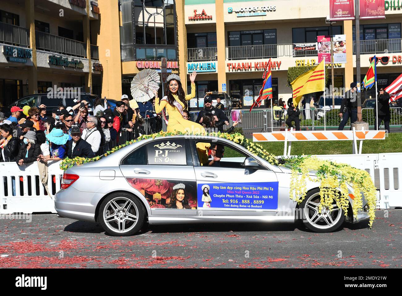 WESTMINSTER, CALIFORNIA - 22 JAN 2023: The 2022 Miss Nail Queen ride satop a vehicle in the Tet Parade Celebrating the Year of the Cat. Stock Photo