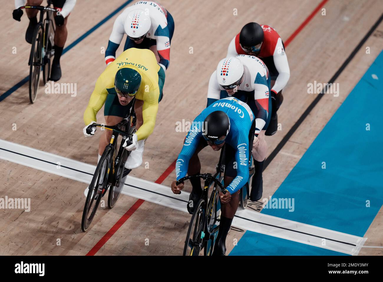 Riders compete during the track cycling men s keirin race at the