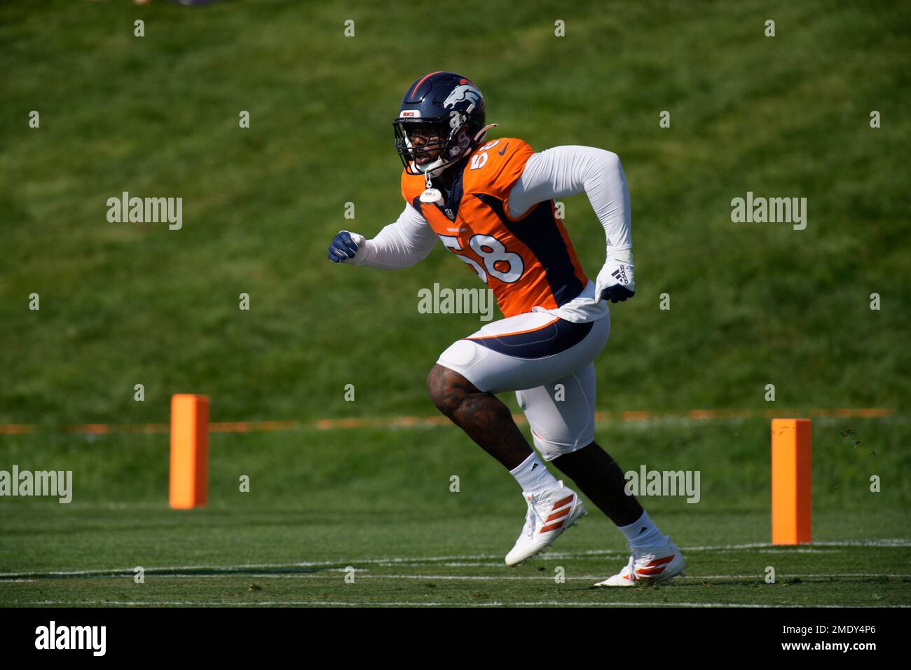 Denver Broncos outside linebacker Von Miller (58) takes part in drills  during an NFL football training camp Friday, Aug. 6, 2021, at the team's  headquarters in Englewood, Colo. (AP Photo/David Zalubowski Stock