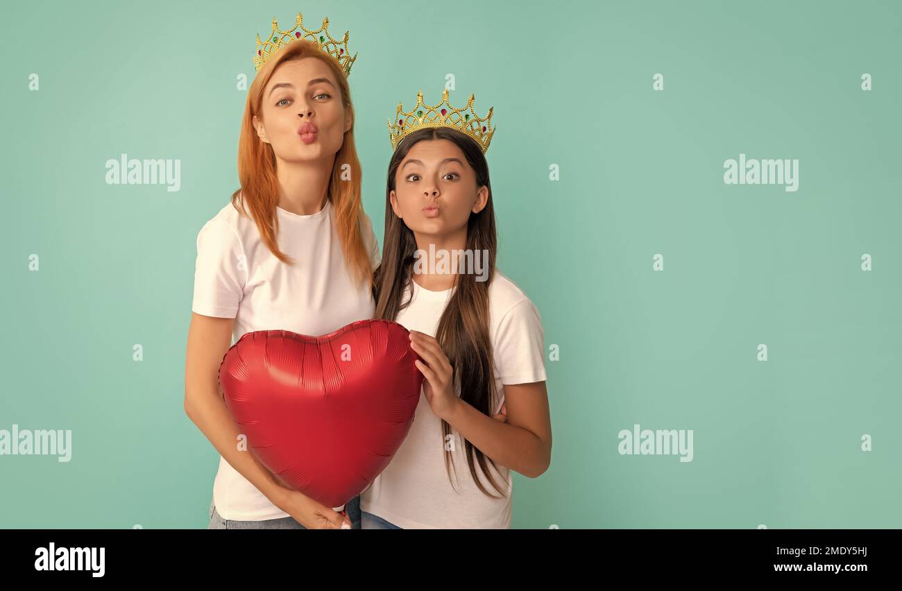 Two hands holding a heart with a crown on top shop
