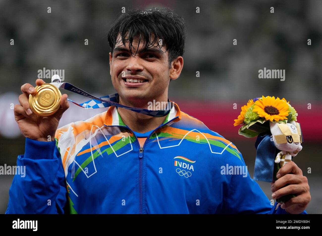 Gold medalist Neeraj Chopra, of India, poses during the medal ceremony