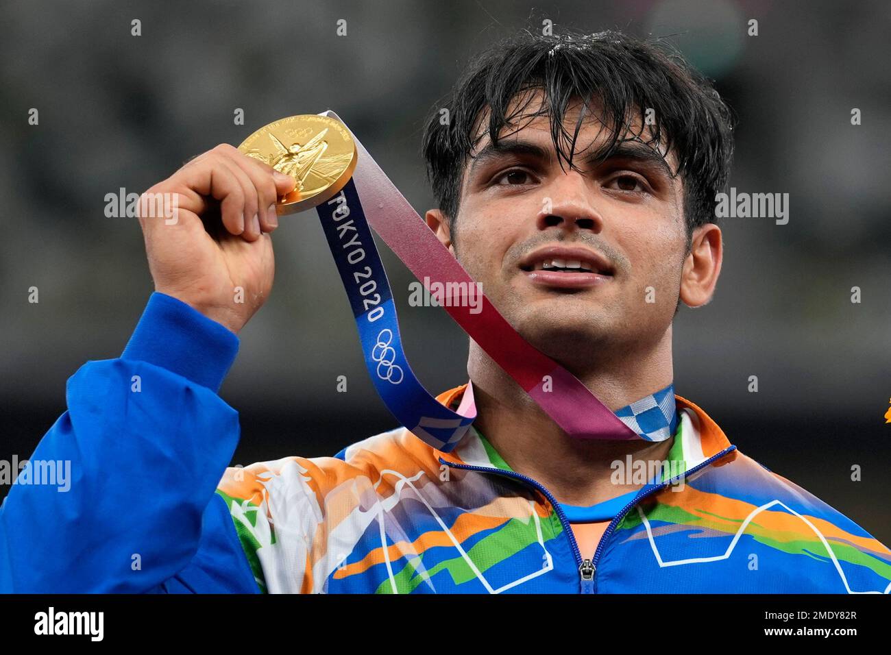 Gold medalist Neeraj Chopra, of India, poses during the medal ceremony