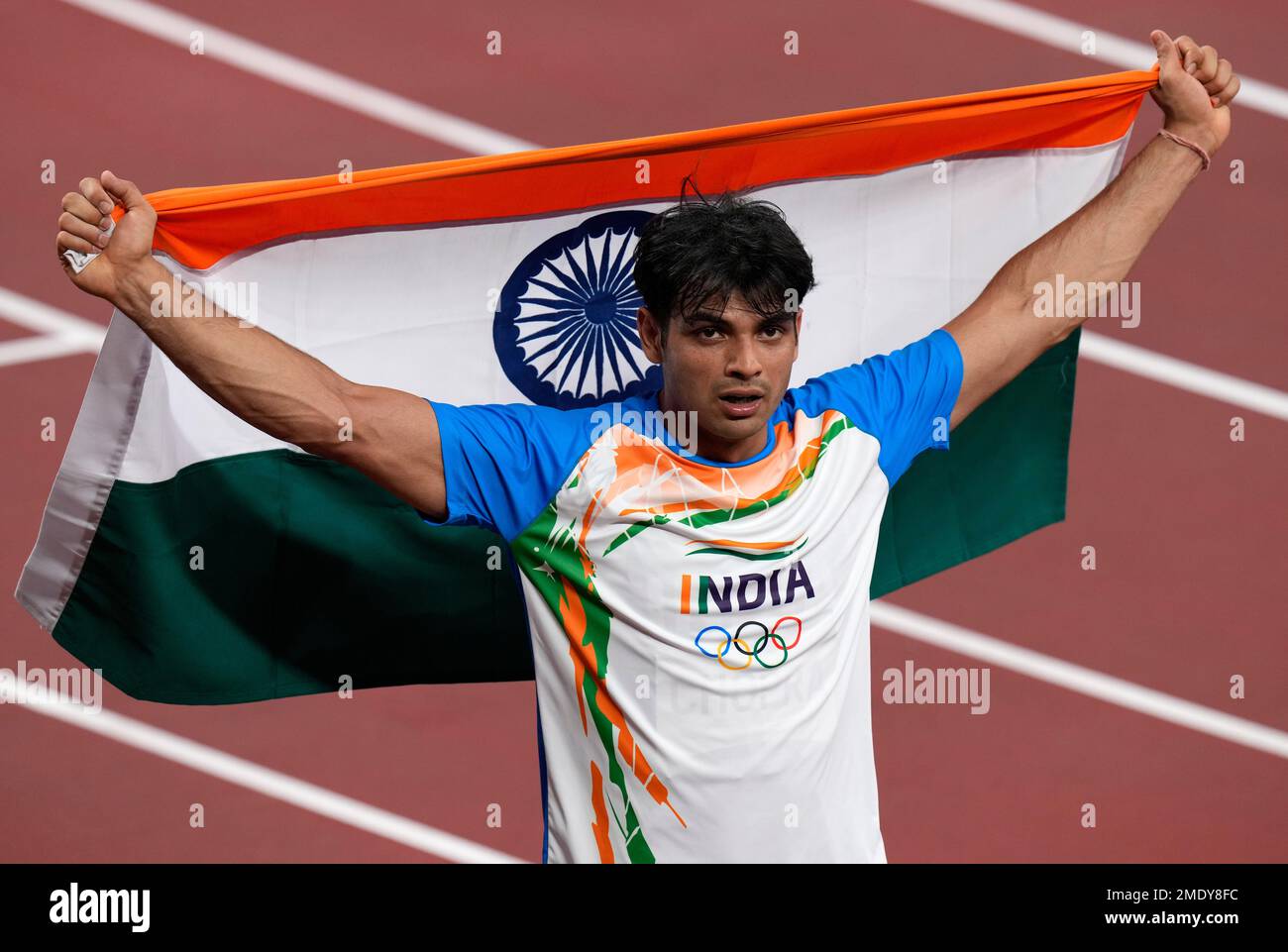 Neeraj Chopra, of India celebrates winning the gold medal in the final