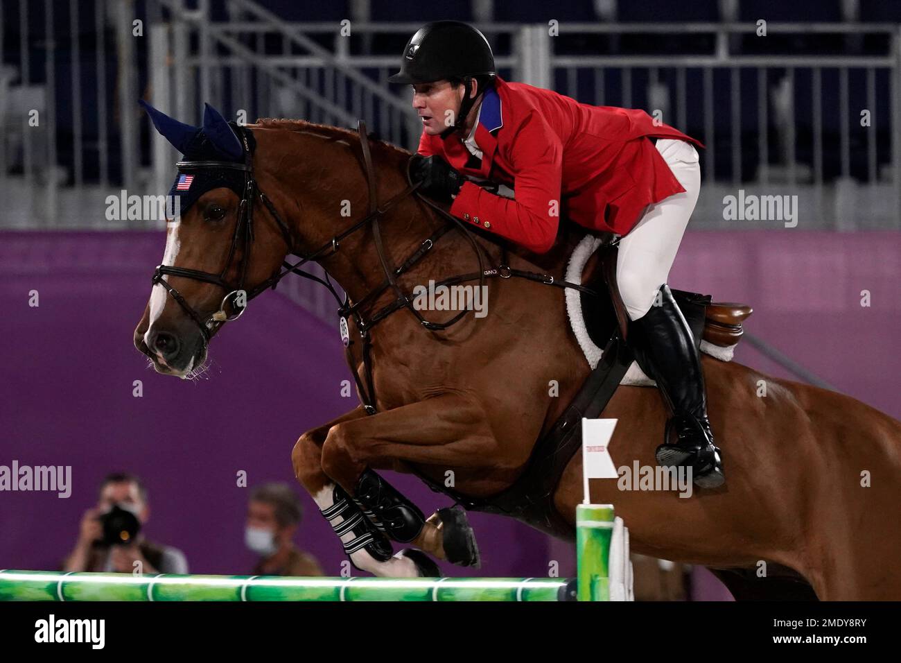 United States McLain Ward, riding Contagious, competes during the equestrian jumping team final at Equestrian Park