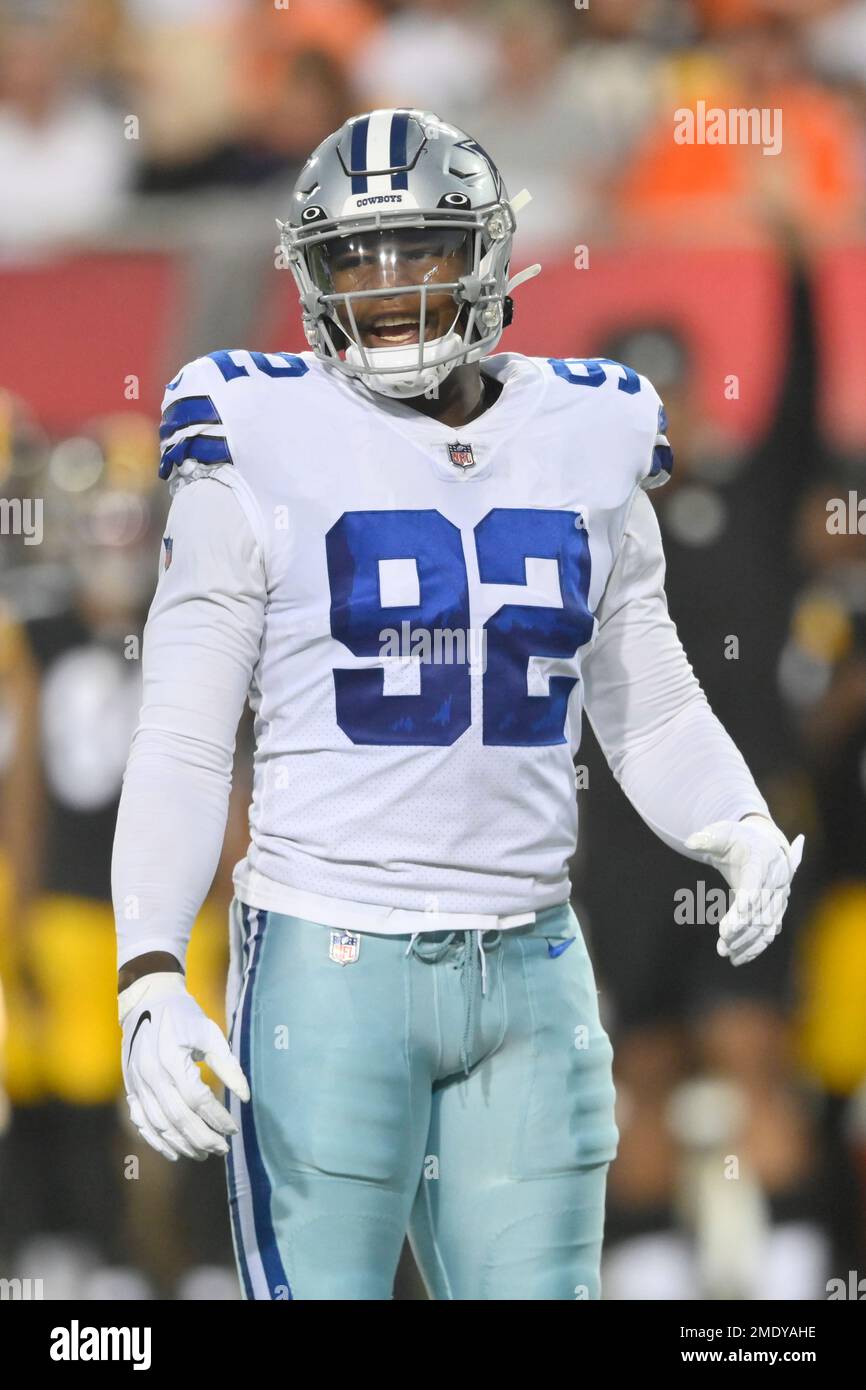 The Dallas Cowboys stand on the field during the first half of an